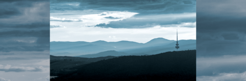 Landscape of photo of Canberra featuring hills and Telstra tower